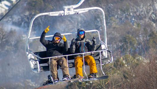 Guests on the Peak Express lift at  Resort